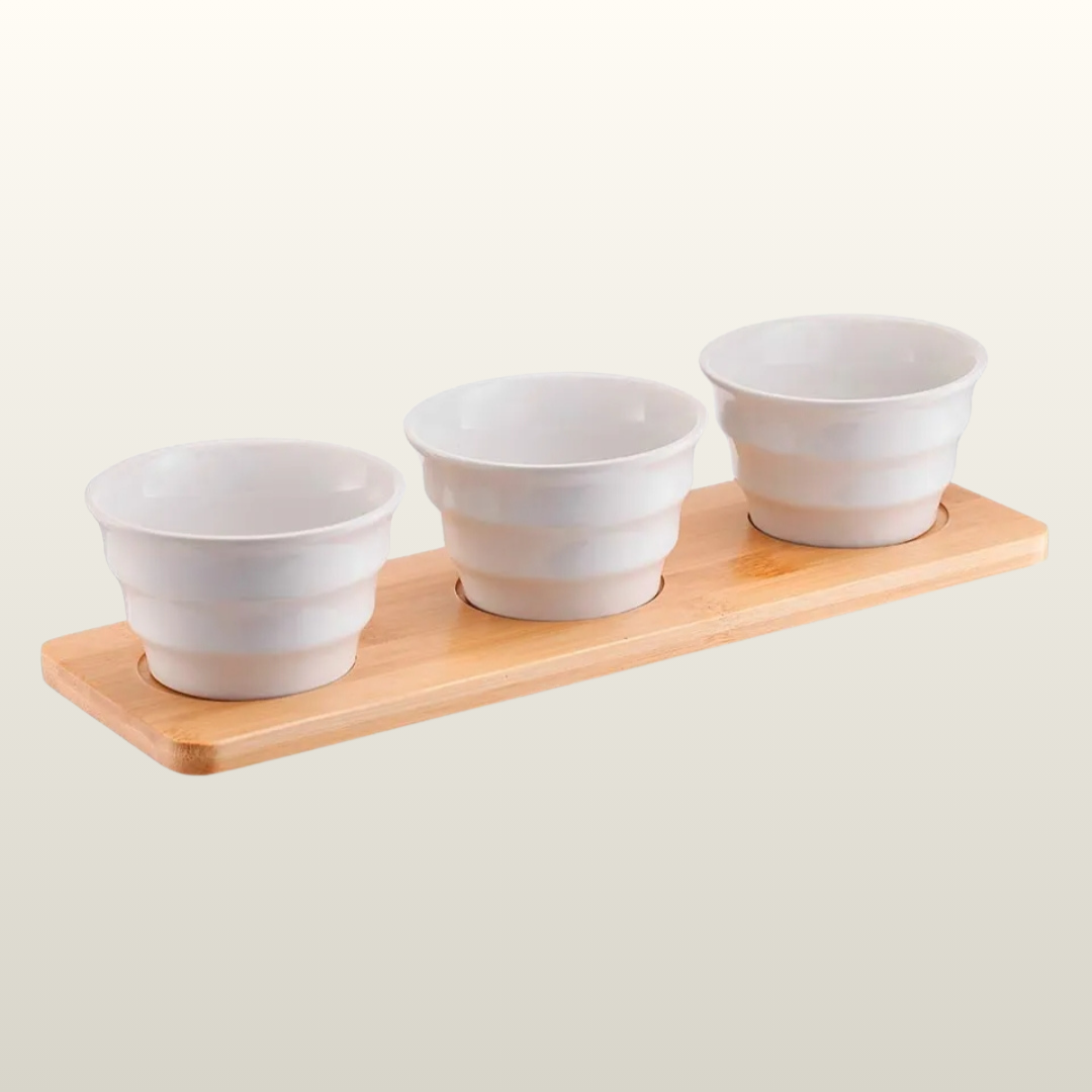 Set of 3 red ceramic appetiser bowls on a white bamboo tray, item no. PN